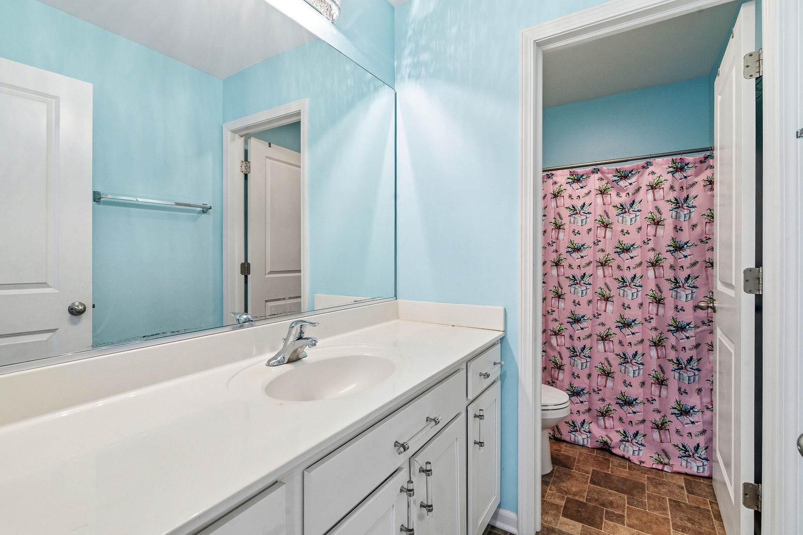 434 Stonebrook Drive Romeoville, IL 60446 - Photo 21 of 38 a bathroom with a sink and a mirror