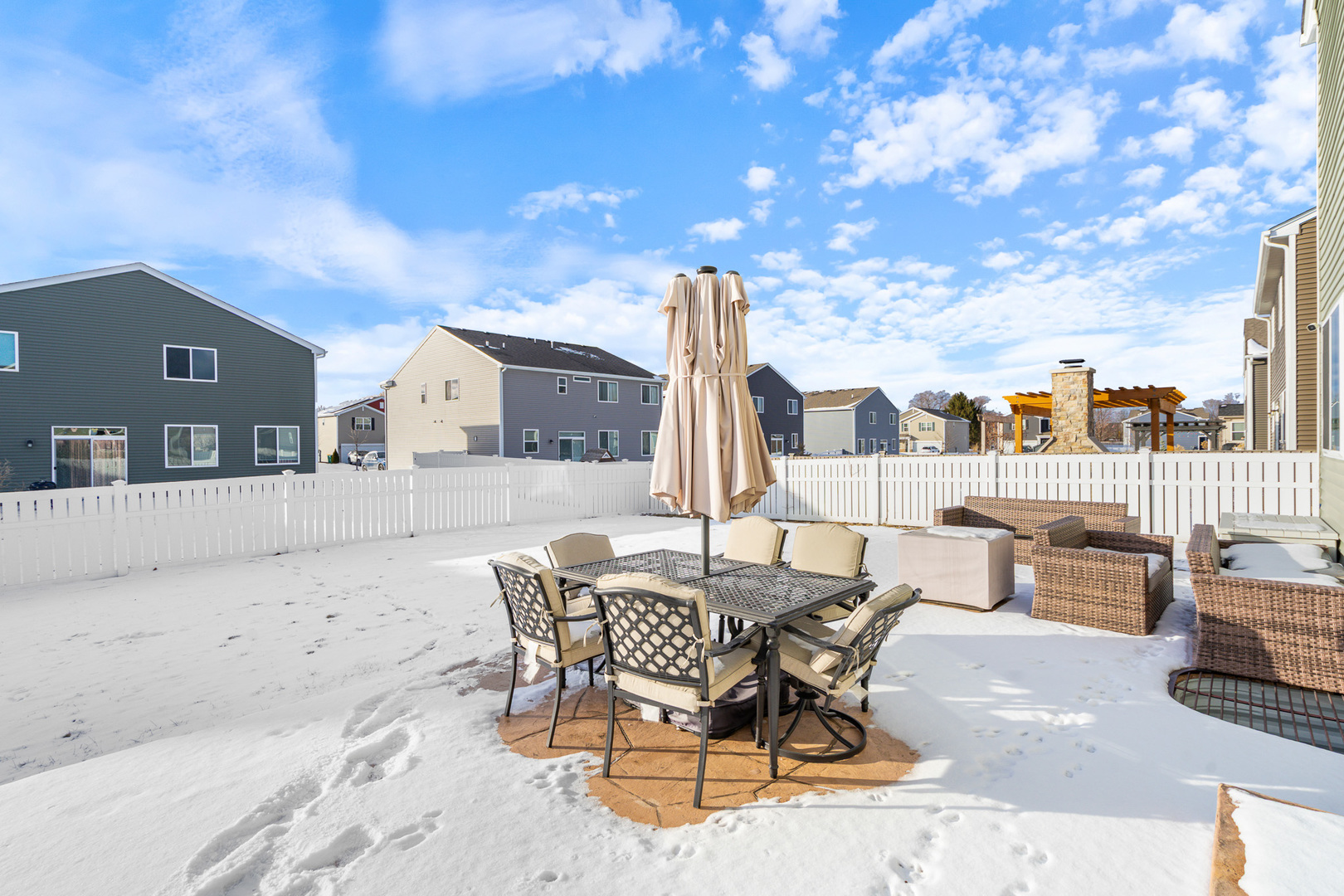 434 Stonebrook Drive Romeoville, IL 60446 - Photo 28 of 38 a view of a patio with a table and chairs