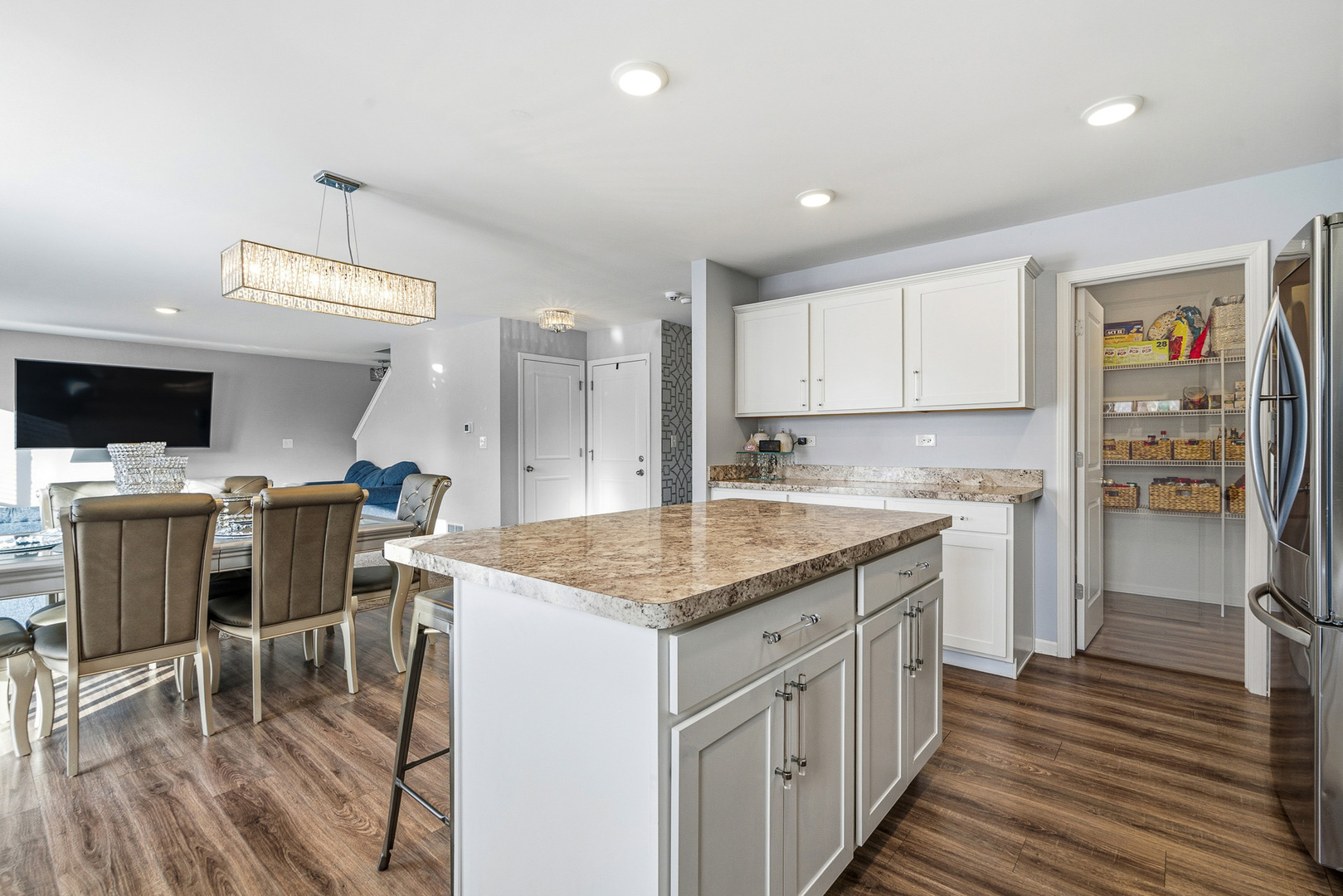434 Stonebrook Drive Romeoville, IL 60446 - Photo 8 of 38 a kitchen with a sink stove cabinets and wooden floor