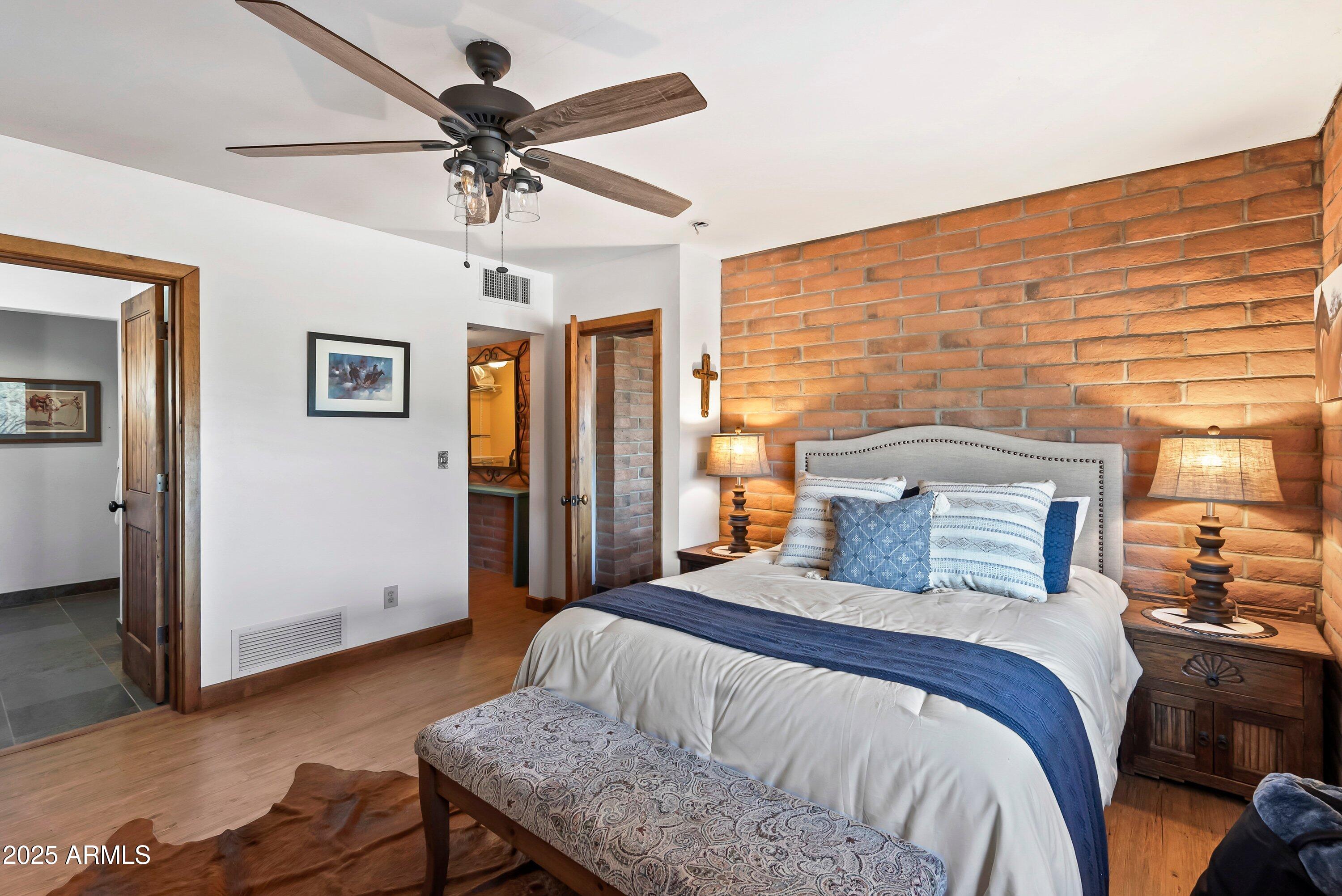 78 Camino Murphy Rio Rico, AZ 85648 - Photo 16 of 51 a bedroom with a bed and window