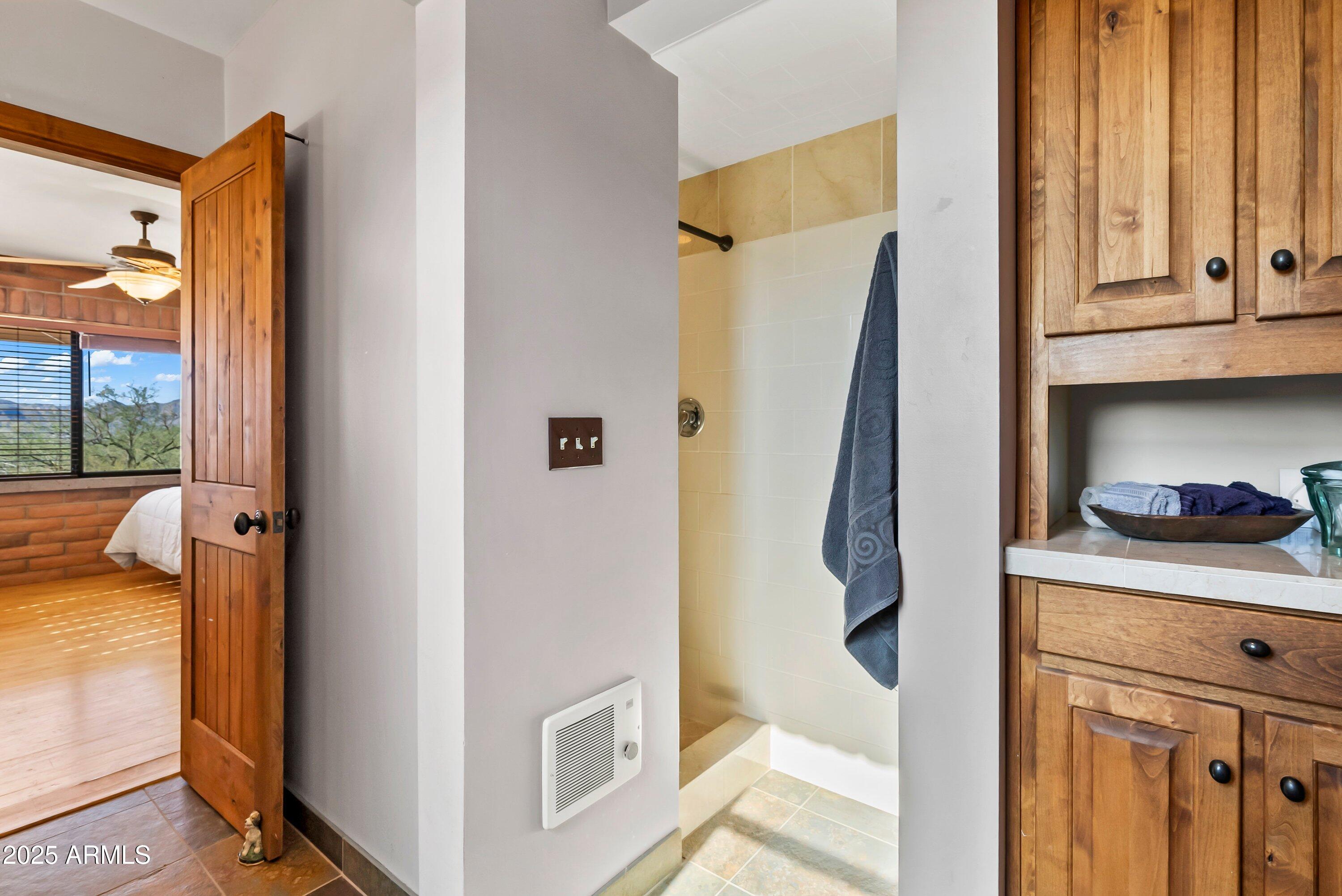78 Camino Murphy Rio Rico, AZ 85648 - Photo 24 of 51 a view of walk in closet with clothes and shoes