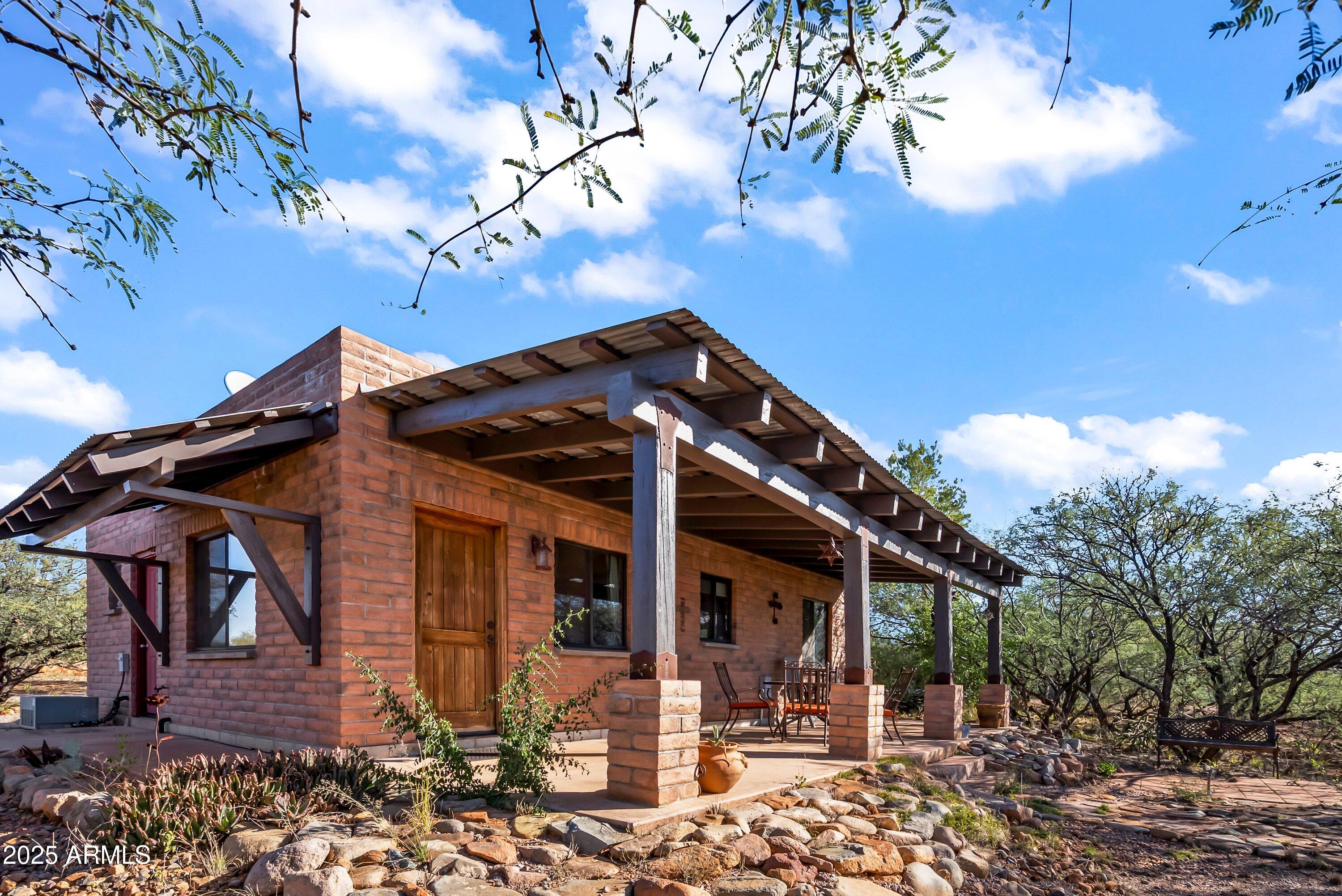 78 Camino Murphy Rio Rico, AZ 85648 - Photo 29 of 51 a view of a house with large windows