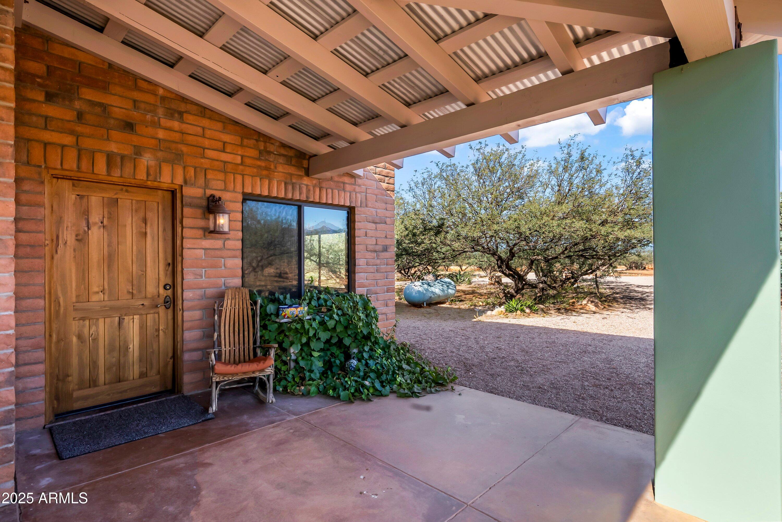 78 Camino Murphy Rio Rico, AZ 85648 - Photo 38 of 51 a view of a backyard with garden