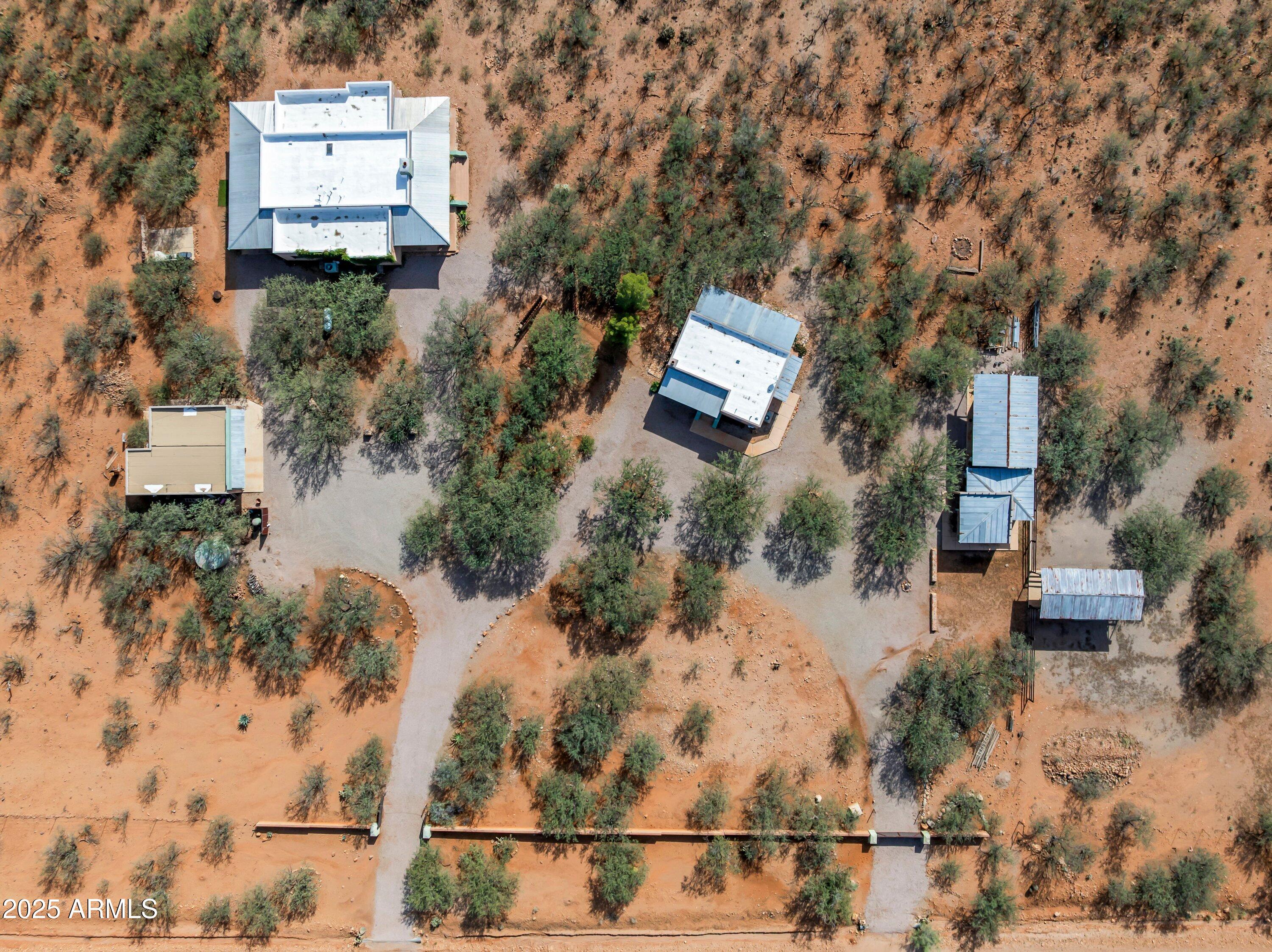 78 Camino Murphy Rio Rico, AZ 85648 - Photo 41 of 51 an aerial view of a house with a yard
