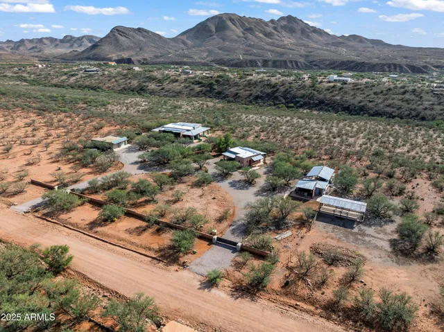 a view of a car park in front of house
