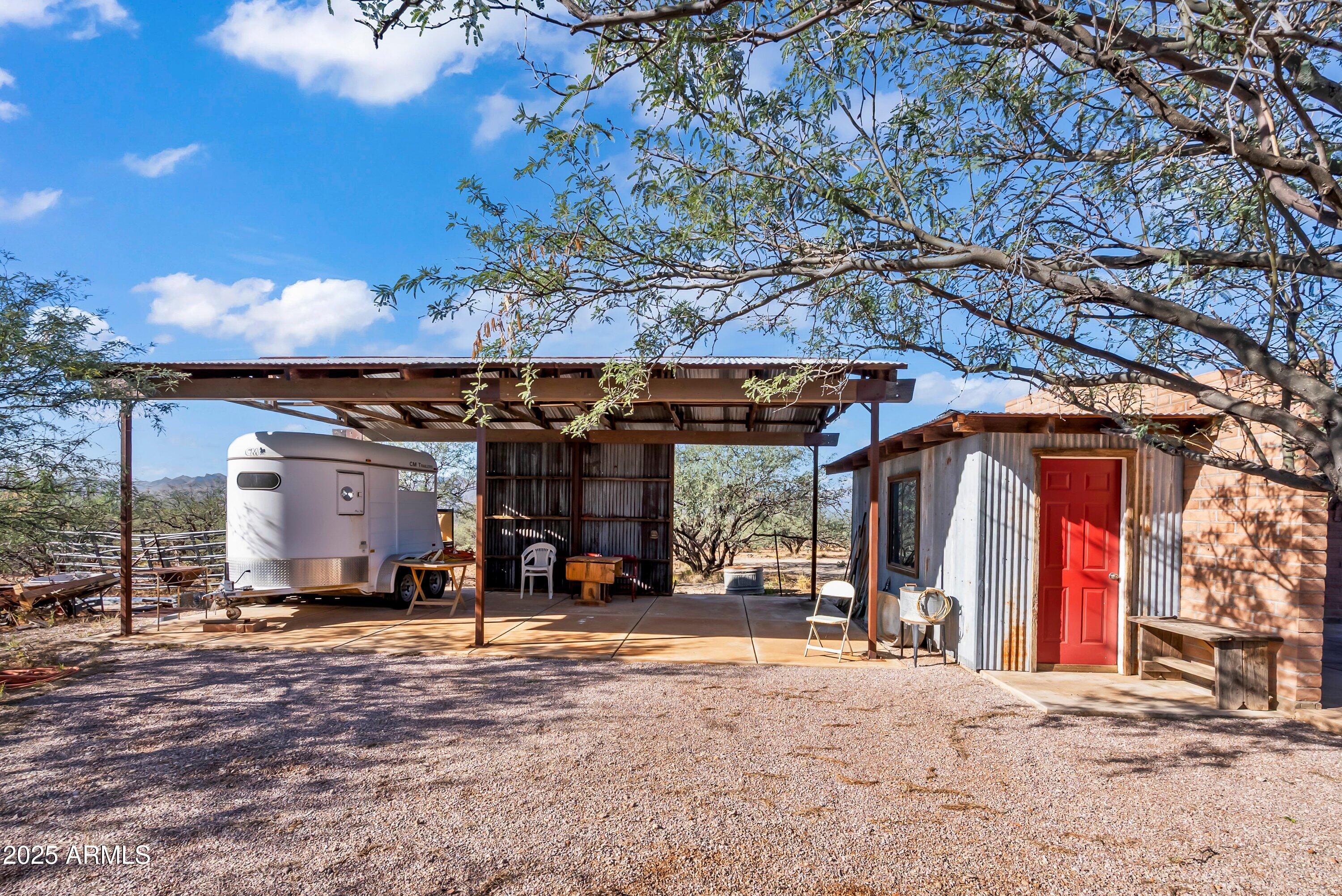 78 Camino Murphy Rio Rico, AZ 85648 - Photo 45 of 51 a view of a car park in front of house