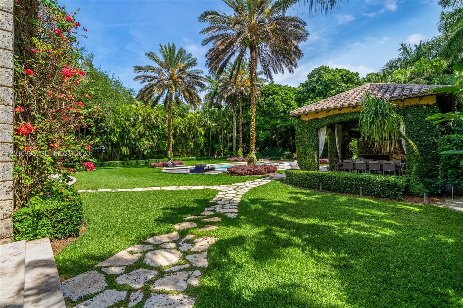 4790 Southwest 78th Street Miami, FL 33143 - Photo 15 of 33 a garden with palm trees