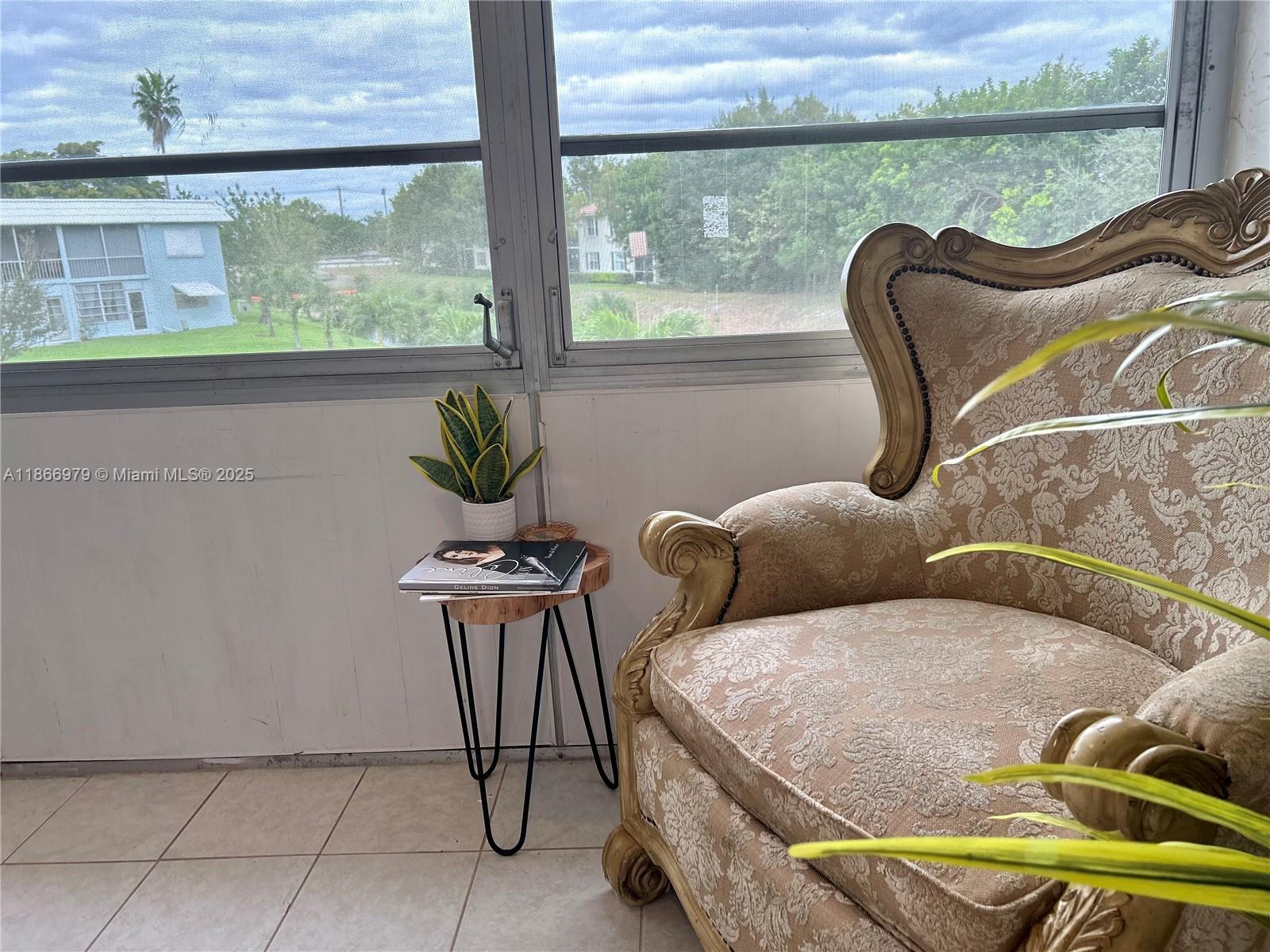 9802 Marina Boulevard, Unit 125 Boca Raton, FL 33428 - Photo 11 of 33 a view of a chairs in a balcony