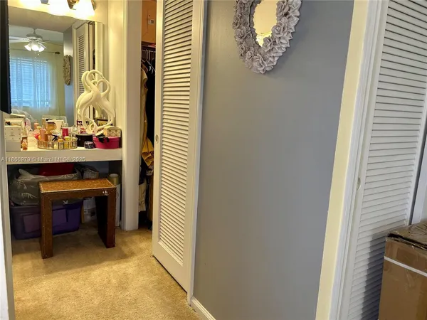 a view of a hallway with workspace