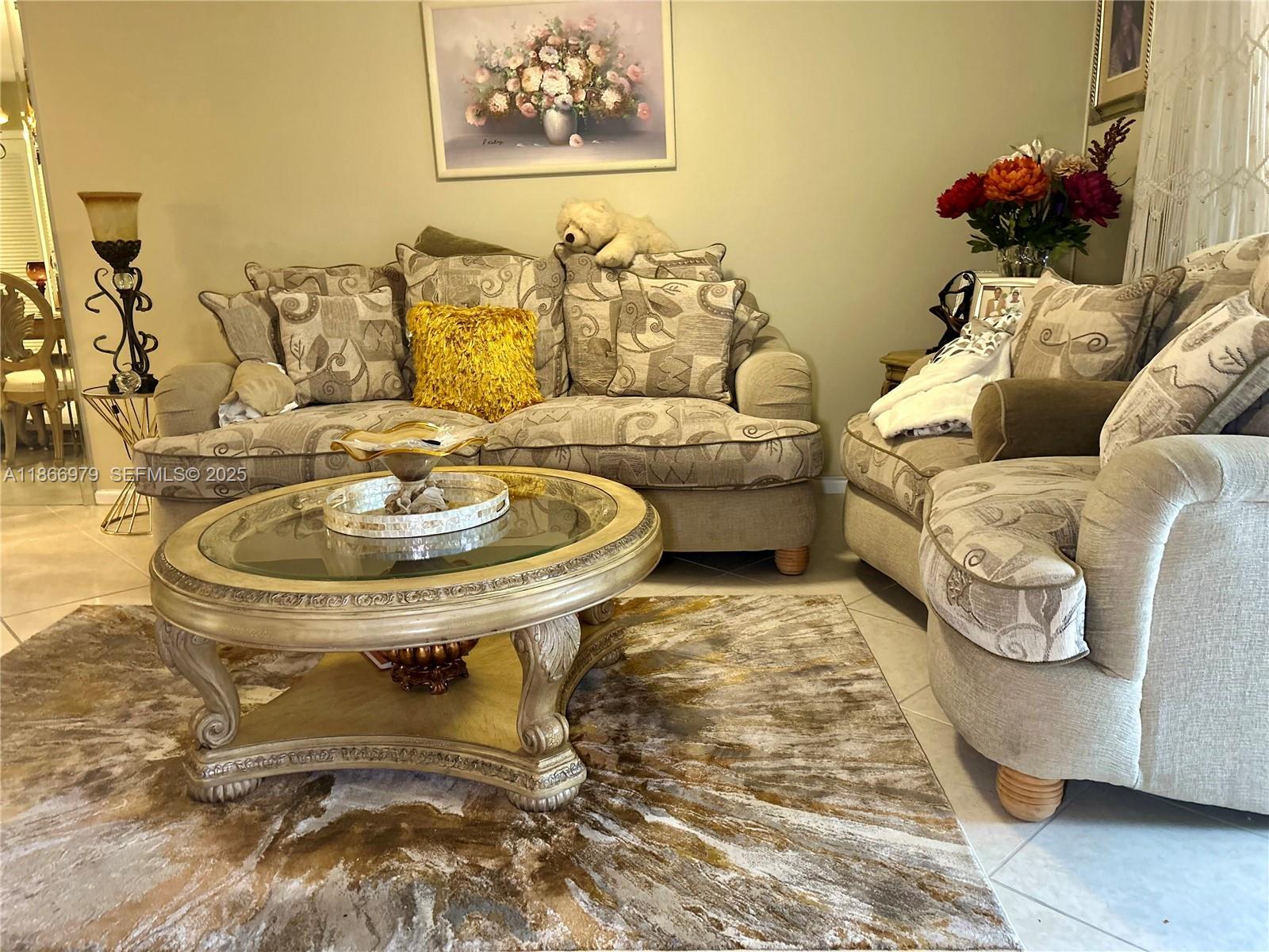 9802 Marina Boulevard, Unit 125 Boca Raton, FL 33428 - Photo 6 of 33 a living room with furniture and a sink