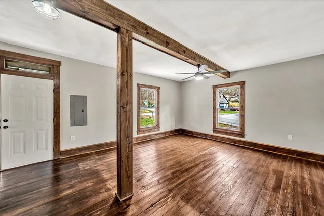 a view of an empty room and window