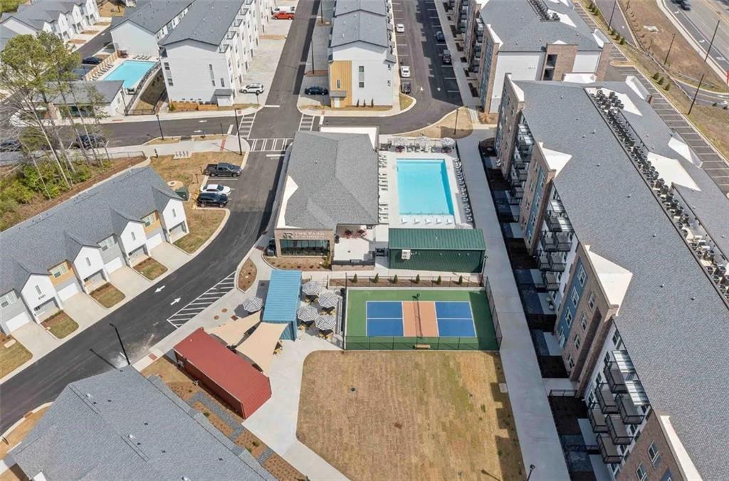 1450 Peachtree Industrial Boulevard, Unit 5109C Sugar Hill, GA 30518 - Photo 30 of 30 an aerial view of a house with outdoor space