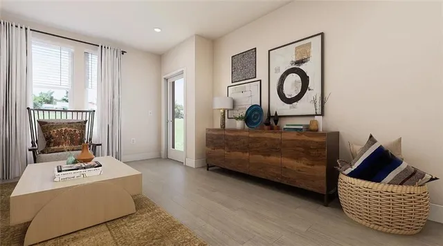 a living room with furniture and a window