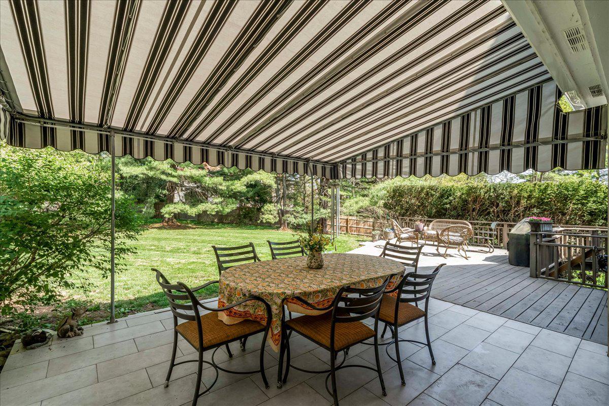 623 South Waterloo Road Devon, PA 19333 - Photo 15 of 31 a view of a patio with table and chairs and potted plants