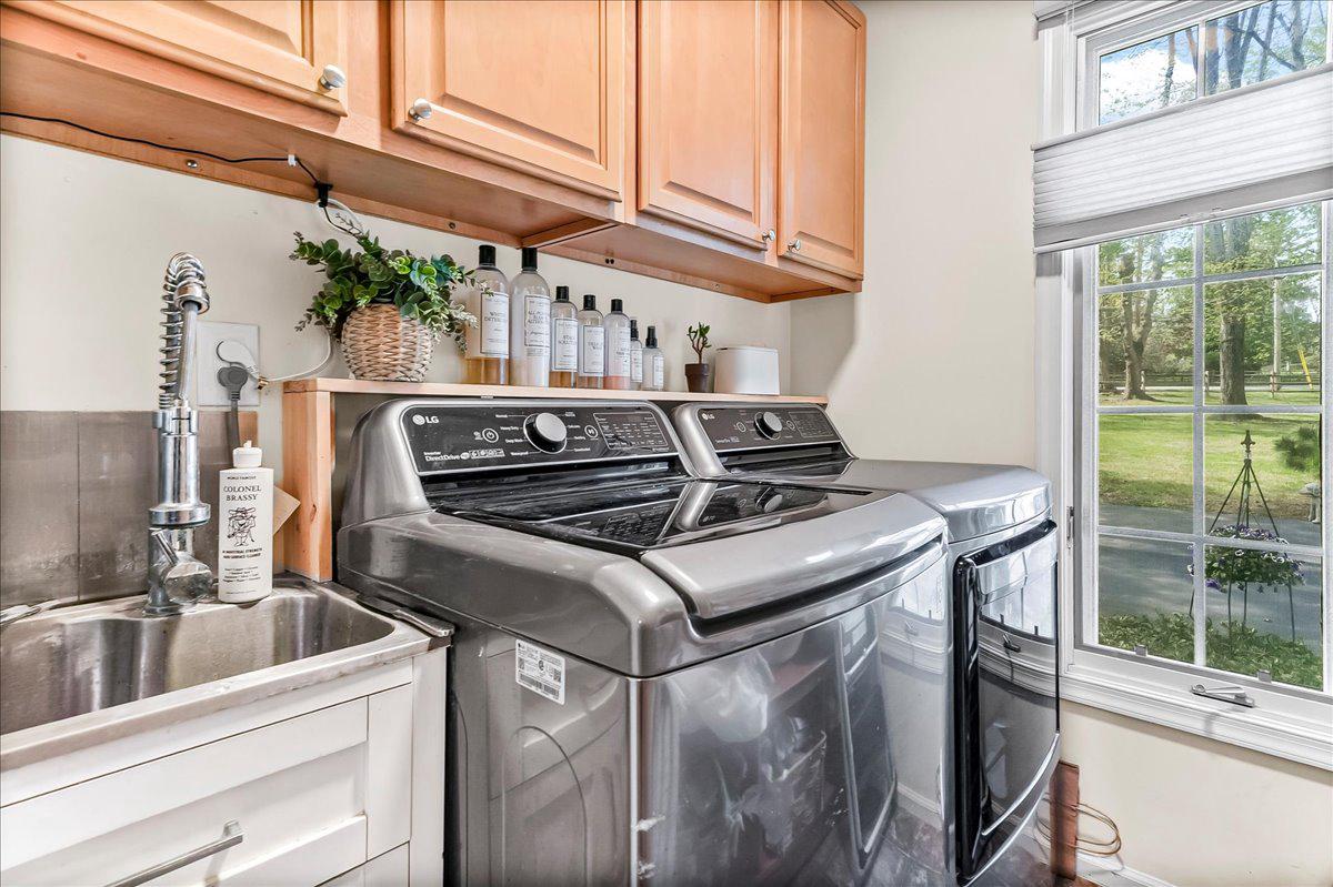 623 South Waterloo Road Devon, PA 19333 - Photo 22 of 31 a kitchen with a stove and a sink