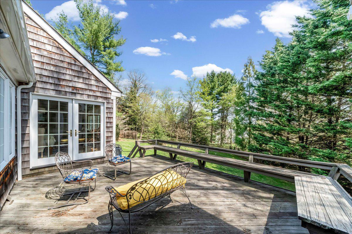623 South Waterloo Road Devon, PA 19333 - Photo 10 of 31 a view of a deck with chairs and potted plants