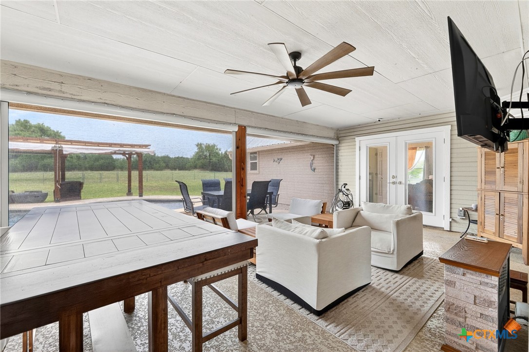 421 Sunset Ridge Drive Killeen, TX 76549 - Photo 42 of 47 a living room with furniture a flat screen tv and a large window