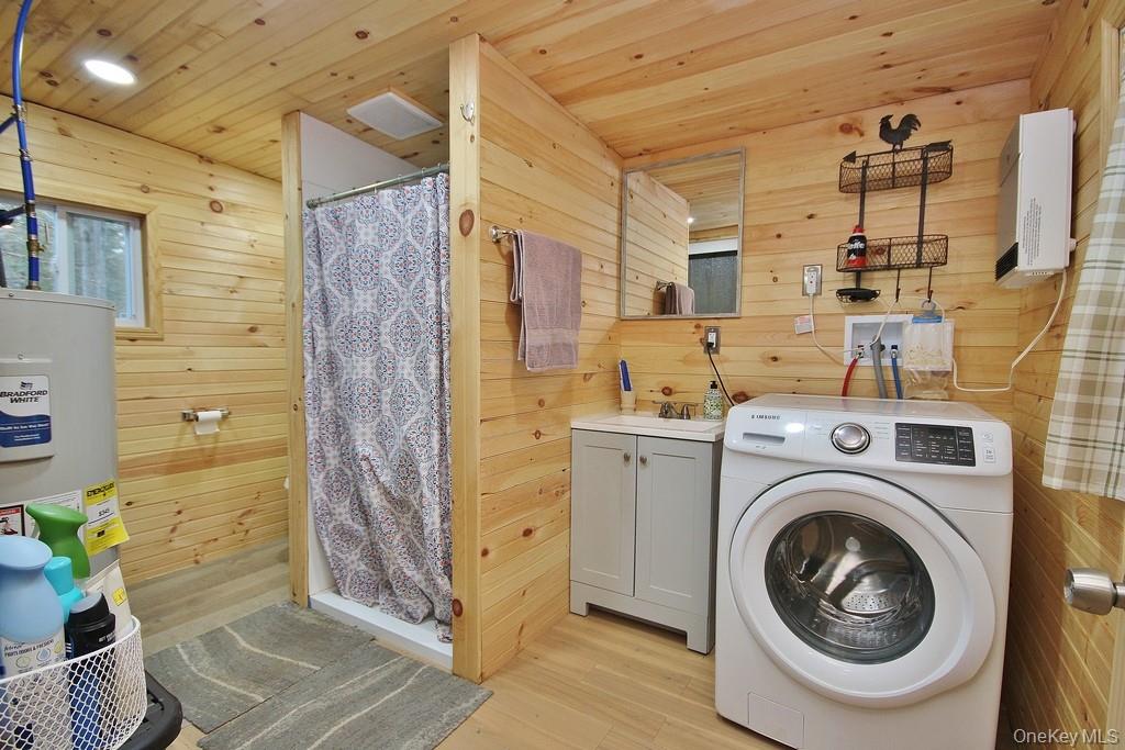 703 Dahlia Road Livingston Manor, NY 12758 - Photo 18 of 44 a utility room with dryer and washer