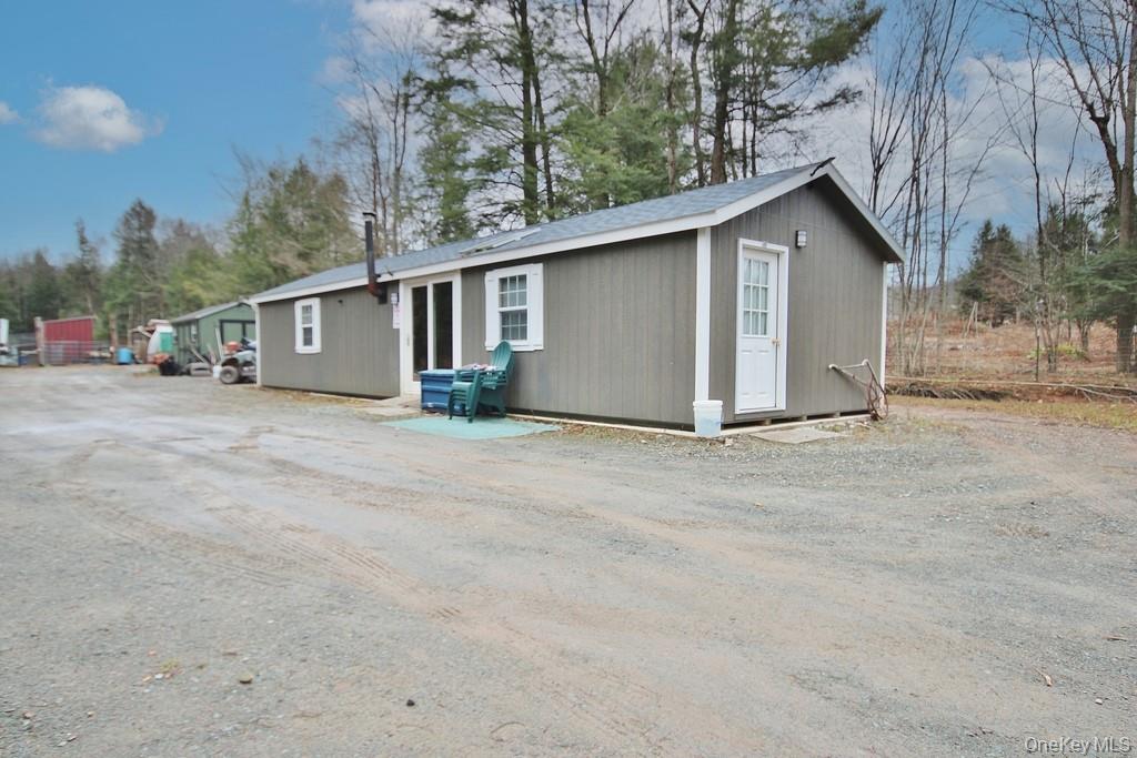 703 Dahlia Road Livingston Manor, NY 12758 - Photo 26 of 44 a view of a house with a yard