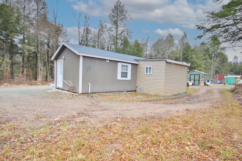 703 Dahlia Road Livingston Manor, NY 12758 - Photo 29 of 44 a backyard of a house