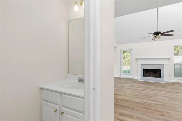 a view of a hallway with a fireplace