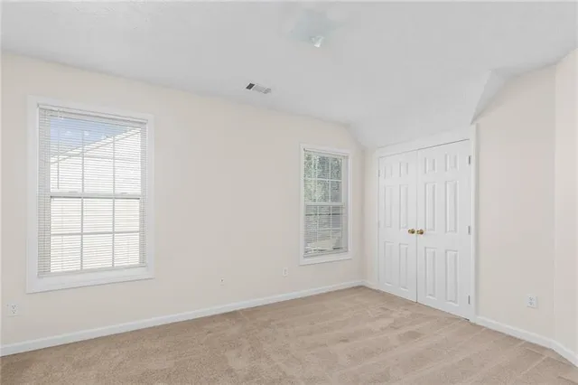 an empty room with windows