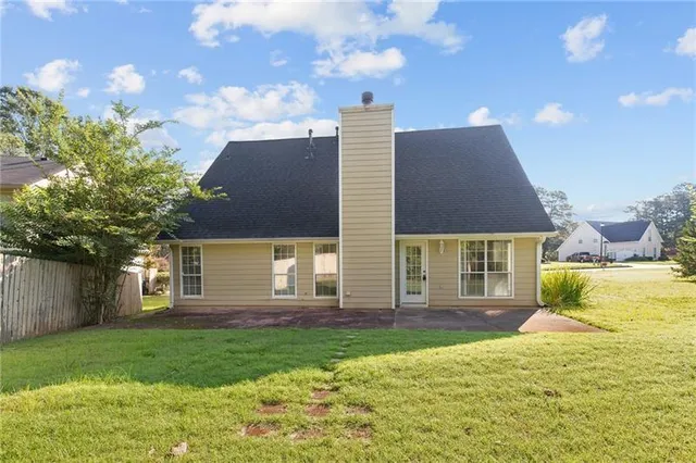 front view of a house with a yard