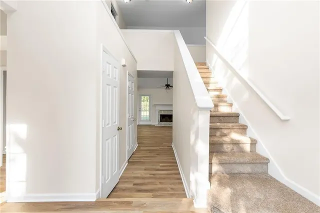 a view of a hallway with staircase