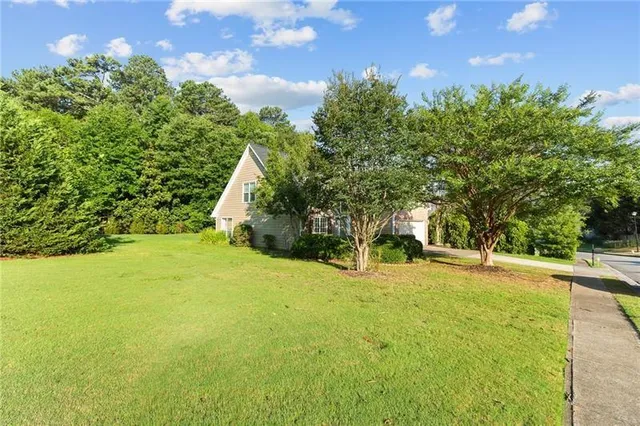 a view of a playground with basketball court