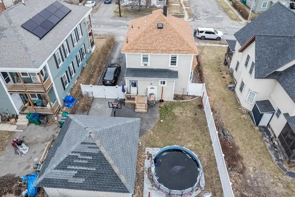 an aerial view of a house with swimming pool