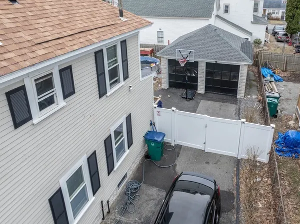 a view of an house with roof deck and furniture