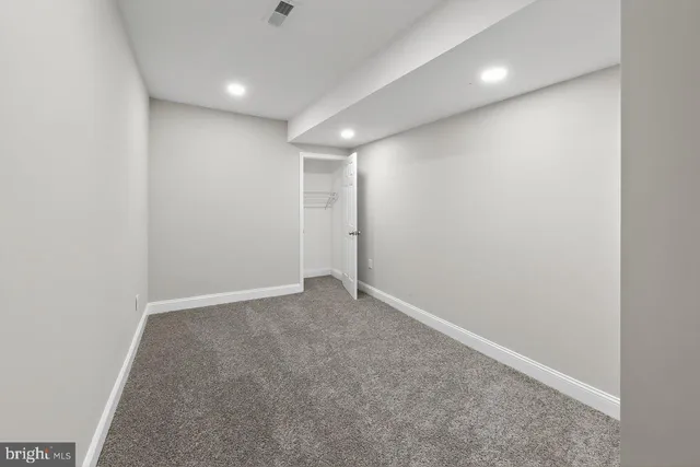 an empty room with an entryway