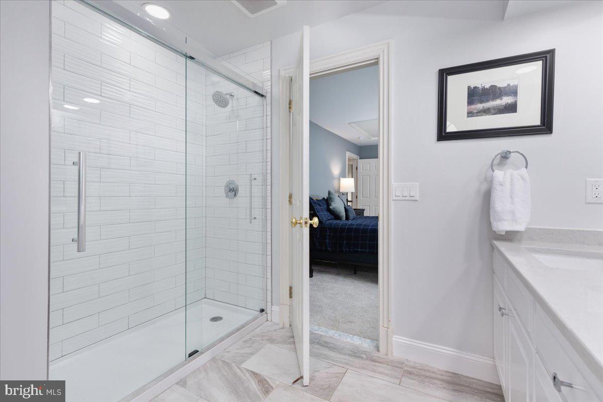 14915 Alpine Bay Loop Gainesville, VA 20155 - Photo 47 of 105 a en suite bathroom with a shower