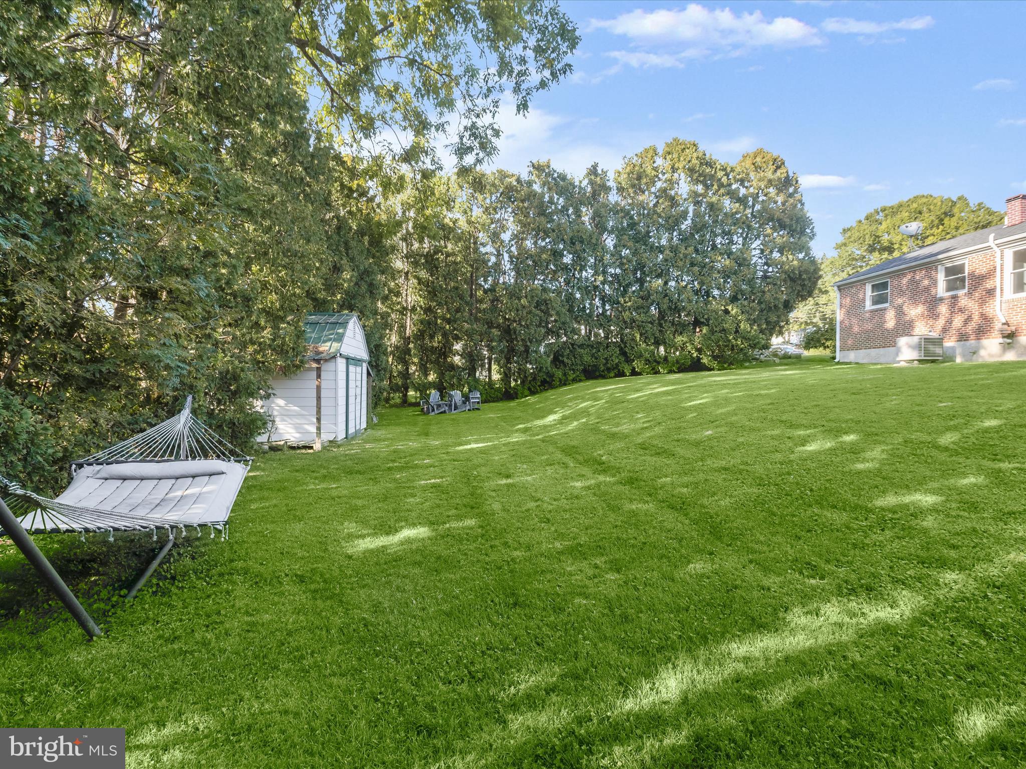 7718 Carter Road Sykesville, MD 21784 - Photo 29 of 39 Rear Lawn Fringed w/ Shade Trees
