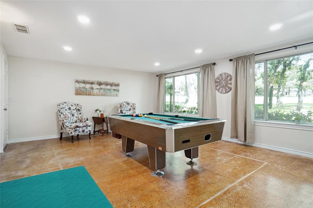 308 Half Moon Way Runaway Bay, TX 76426 - Photo 31 of 40 a room with furniture and a large window