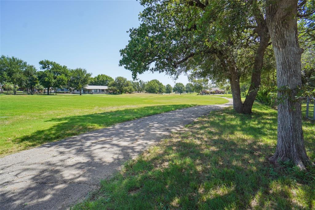 308 Half Moon Way Runaway Bay, TX 76426 - Photo 37 of 40 a view of a park with large trees