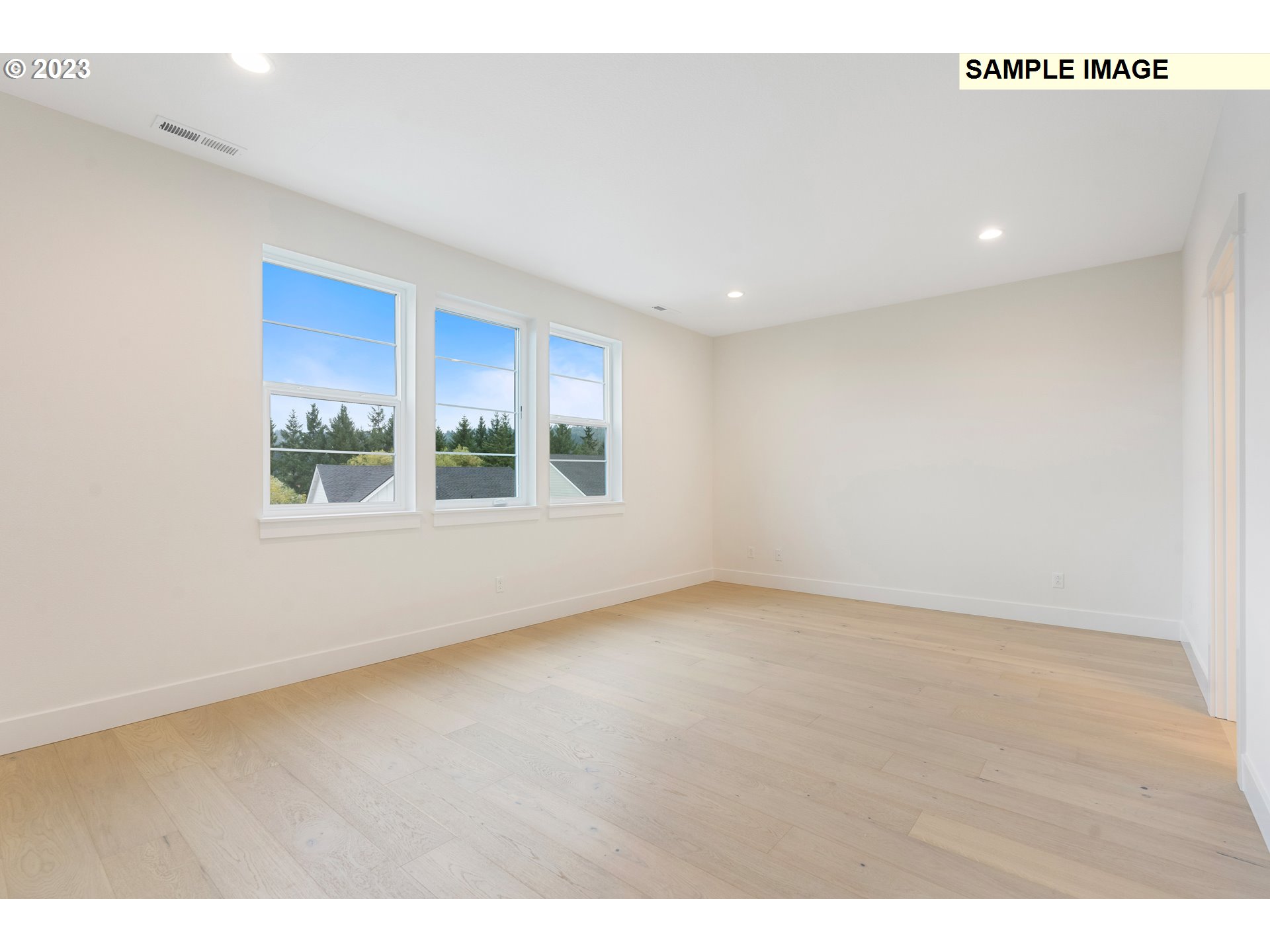 16060 Northwest Holman Way, Unit L79 Portland, OR 97229 - Photo 11 of 33 a view of an empty room with a window