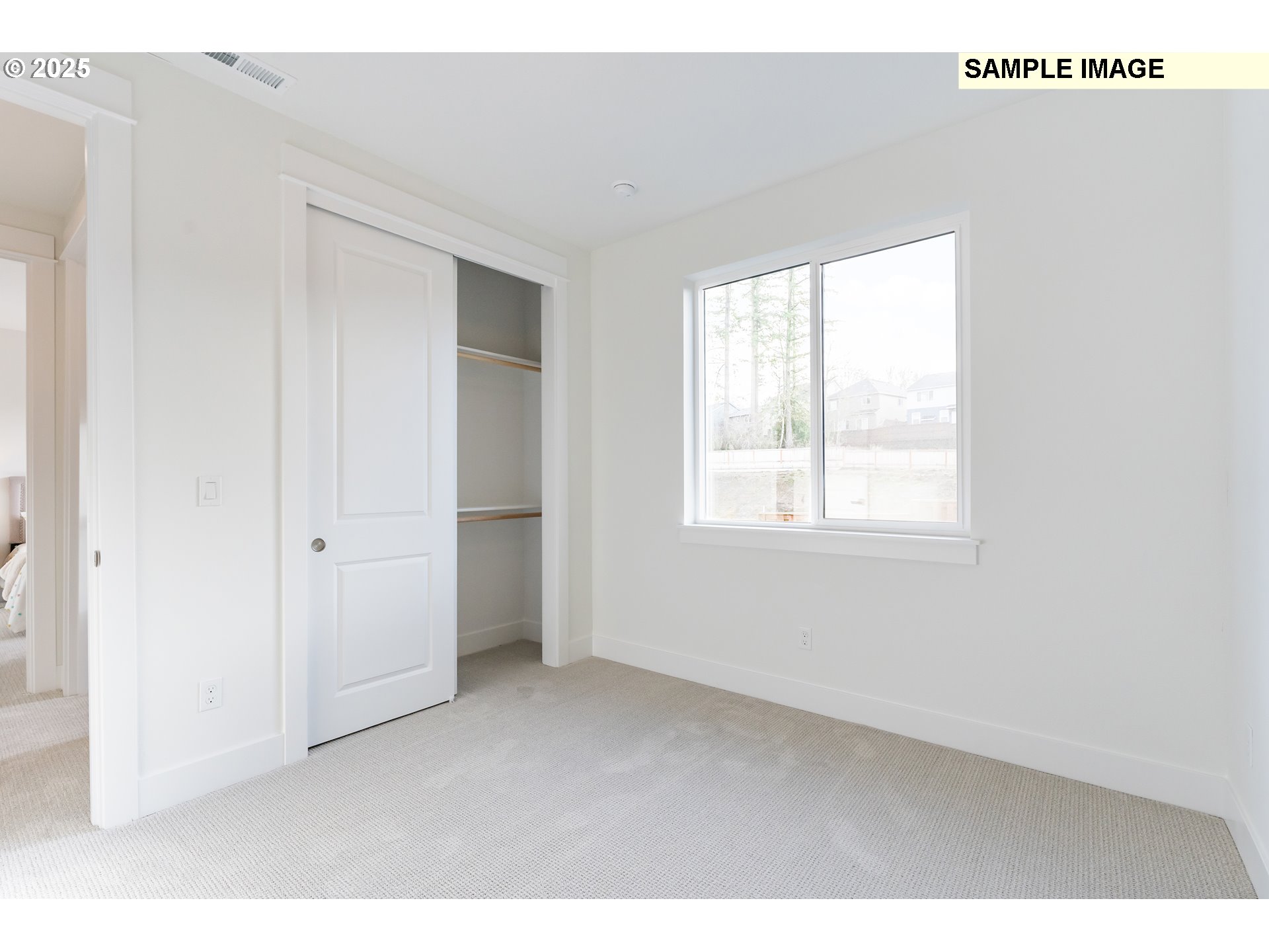 16060 Northwest Holman Way, Unit L79 Portland, OR 97229 - Photo 23 of 33 a view of an empty room with a window