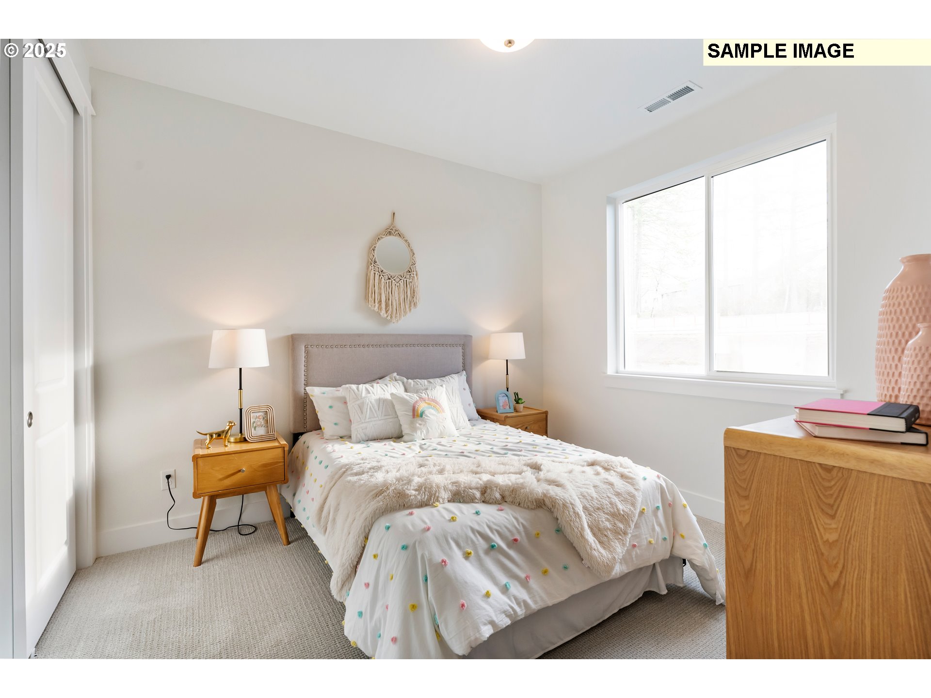 16060 Northwest Holman Way, Unit L79 Portland, OR 97229 - Photo 25 of 33 a bedroom with a bed and window