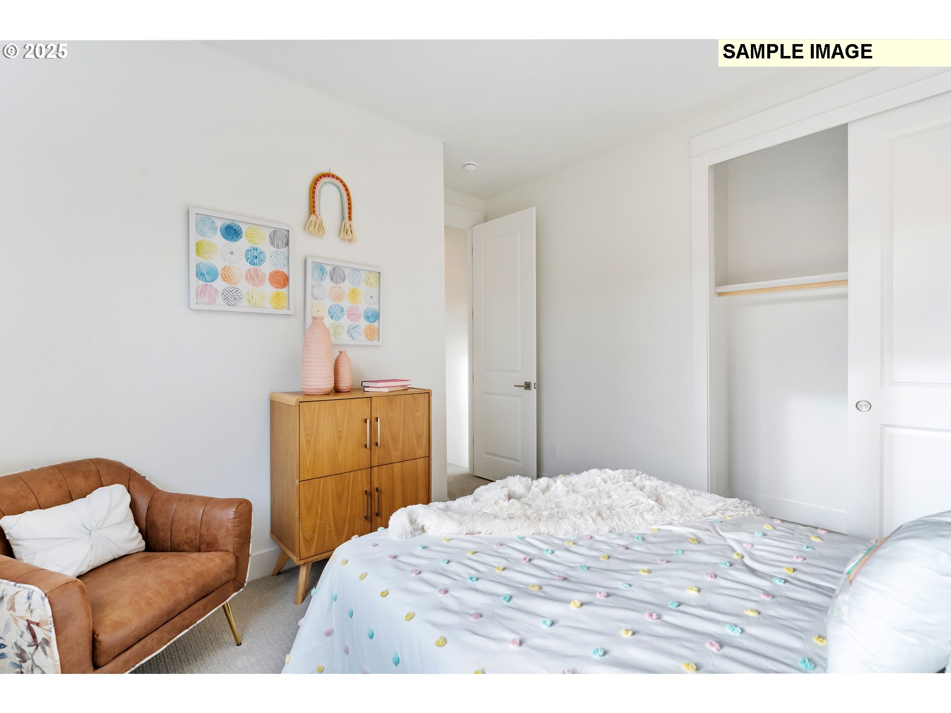 16060 Northwest Holman Way, Unit L79 Portland, OR 97229 - Photo 26 of 33 a bedroom with a bed and a couch