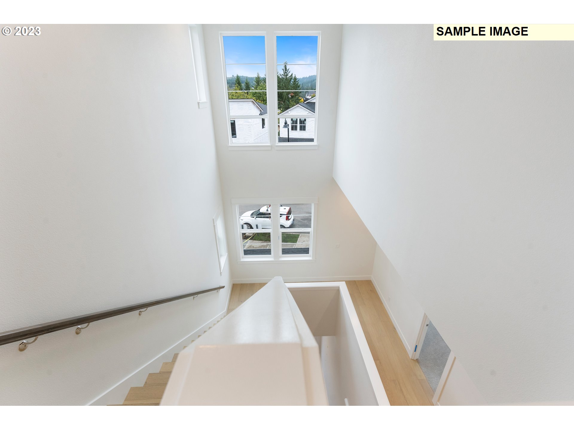 16060 Northwest Holman Way, Unit L79 Portland, OR 97229 - Photo 6 of 33 a view of an empty room and window