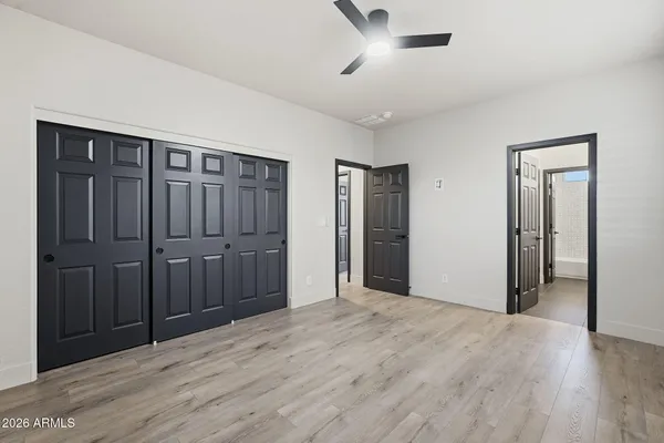 a bathroom with a bathtub and a toilet