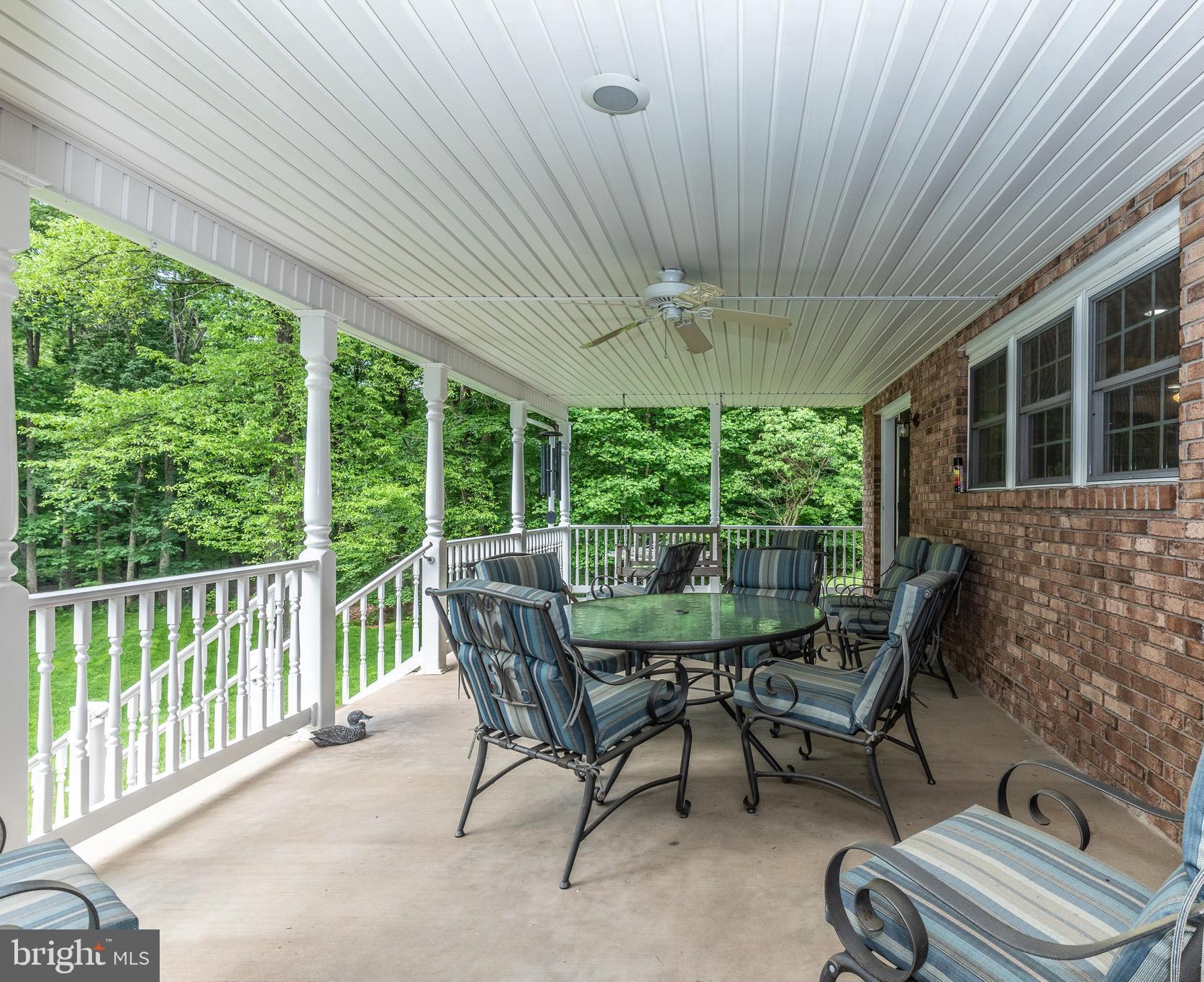 6913 Kellys Store Road Thurmont, MD 21788 - Photo 36 of 49 Spacious Back Porch overlooking Backyard & Forest