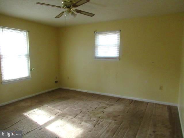 665 Flagstaff Road Lusby, MD 20657 - Photo 4 of 11 an empty room with a window