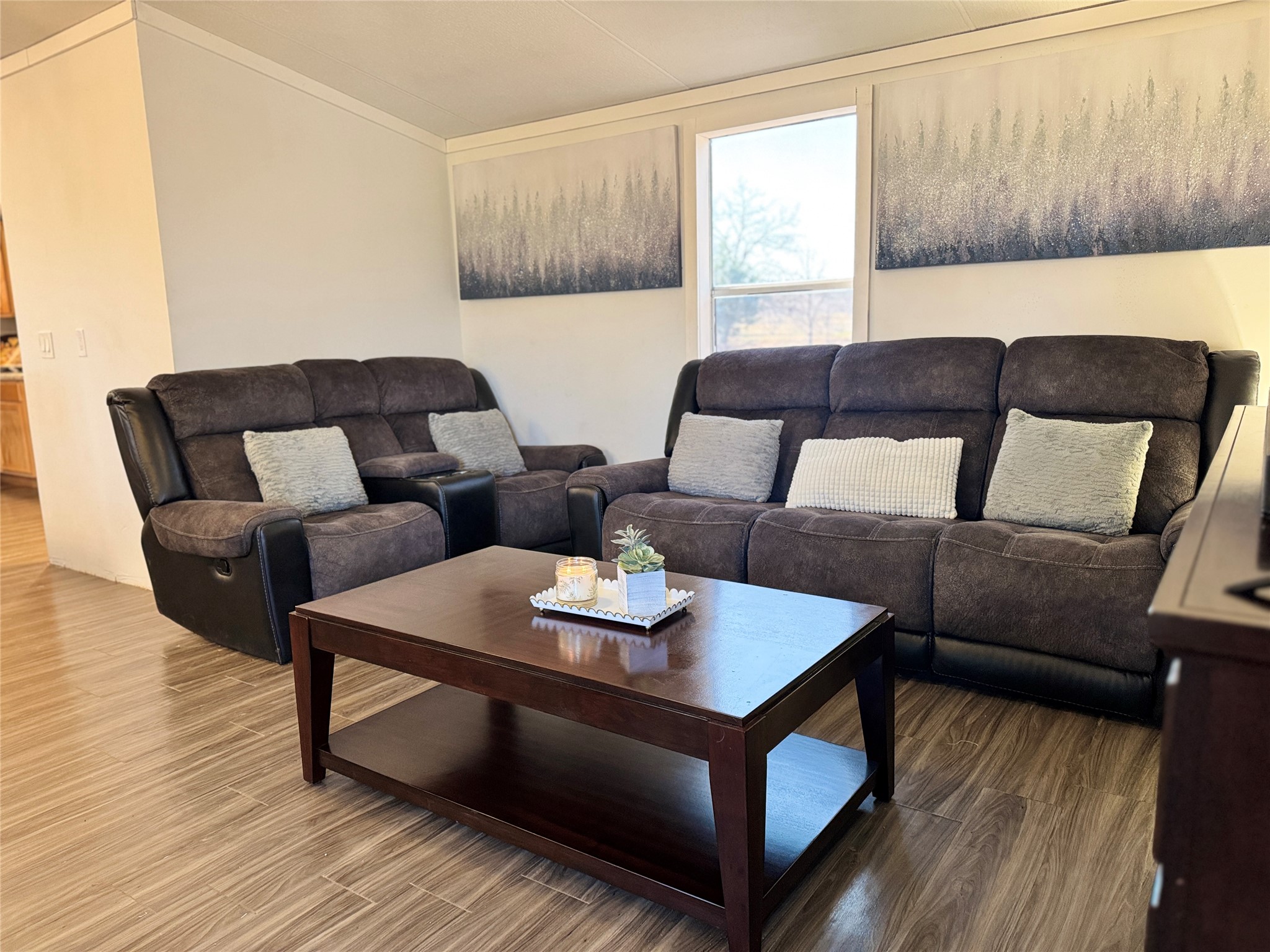 6739 Taylorsville Road Dale, TX 78616 - Photo 15 of 37 a living room with furniture and a wooden floor