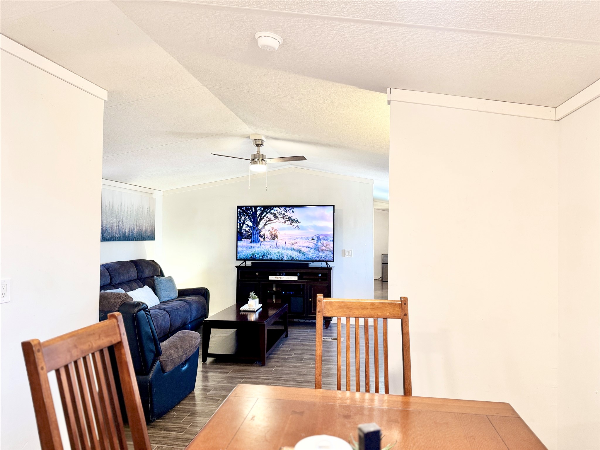 6739 Taylorsville Road Dale, TX 78616 - Photo 16 of 37 a living room with furniture and a flat screen tv