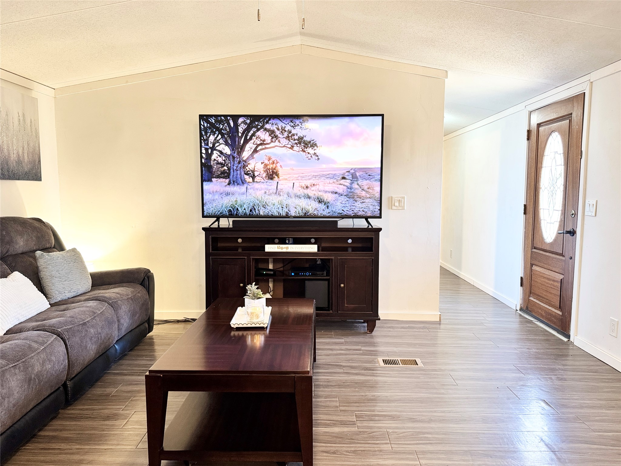 6739 Taylorsville Road Dale, TX 78616 - Photo 18 of 37 a living room with furniture and a flat screen tv