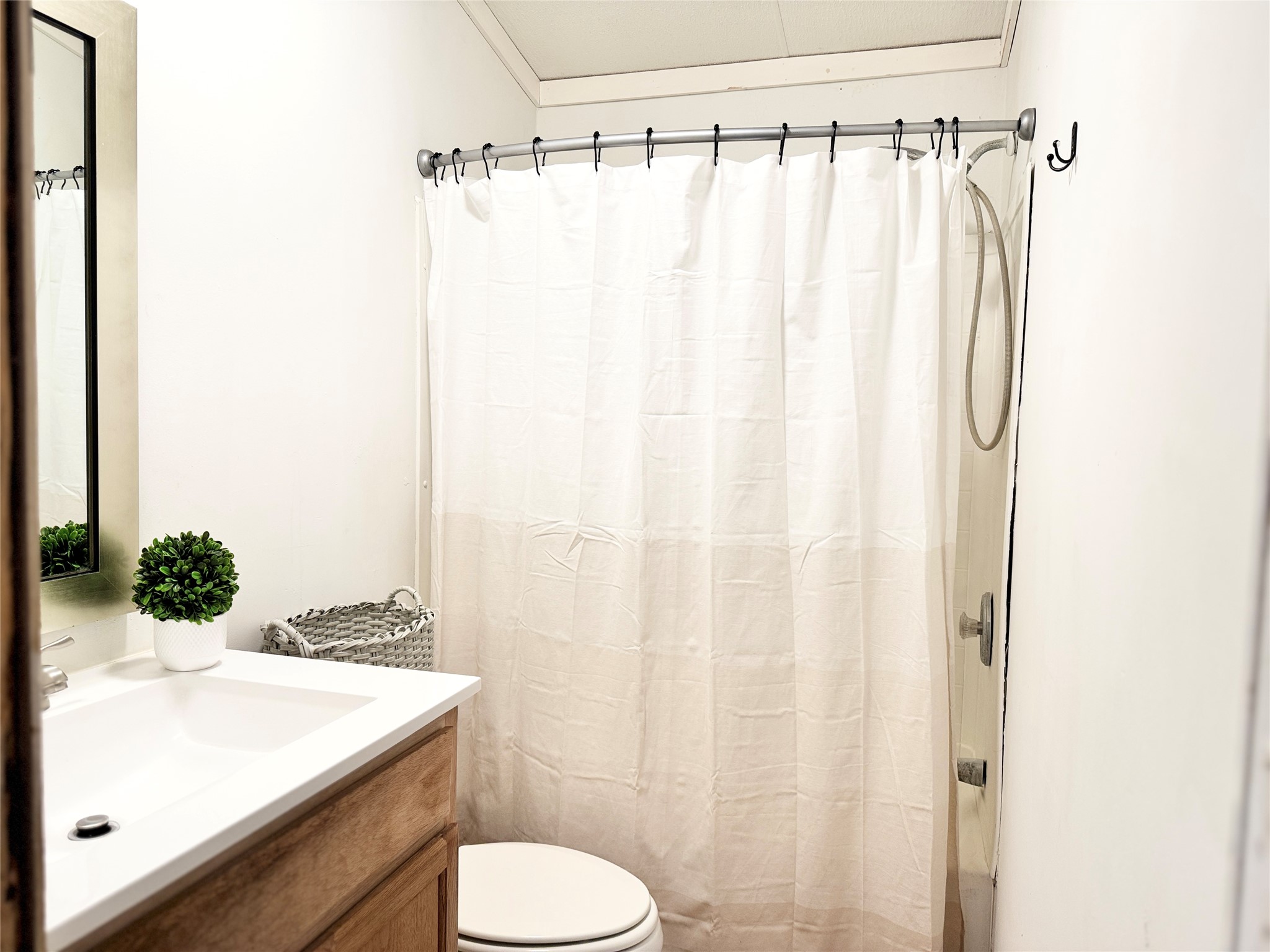 6739 Taylorsville Road Dale, TX 78616 - Photo 19 of 37 a bathroom with a sink and a mirror