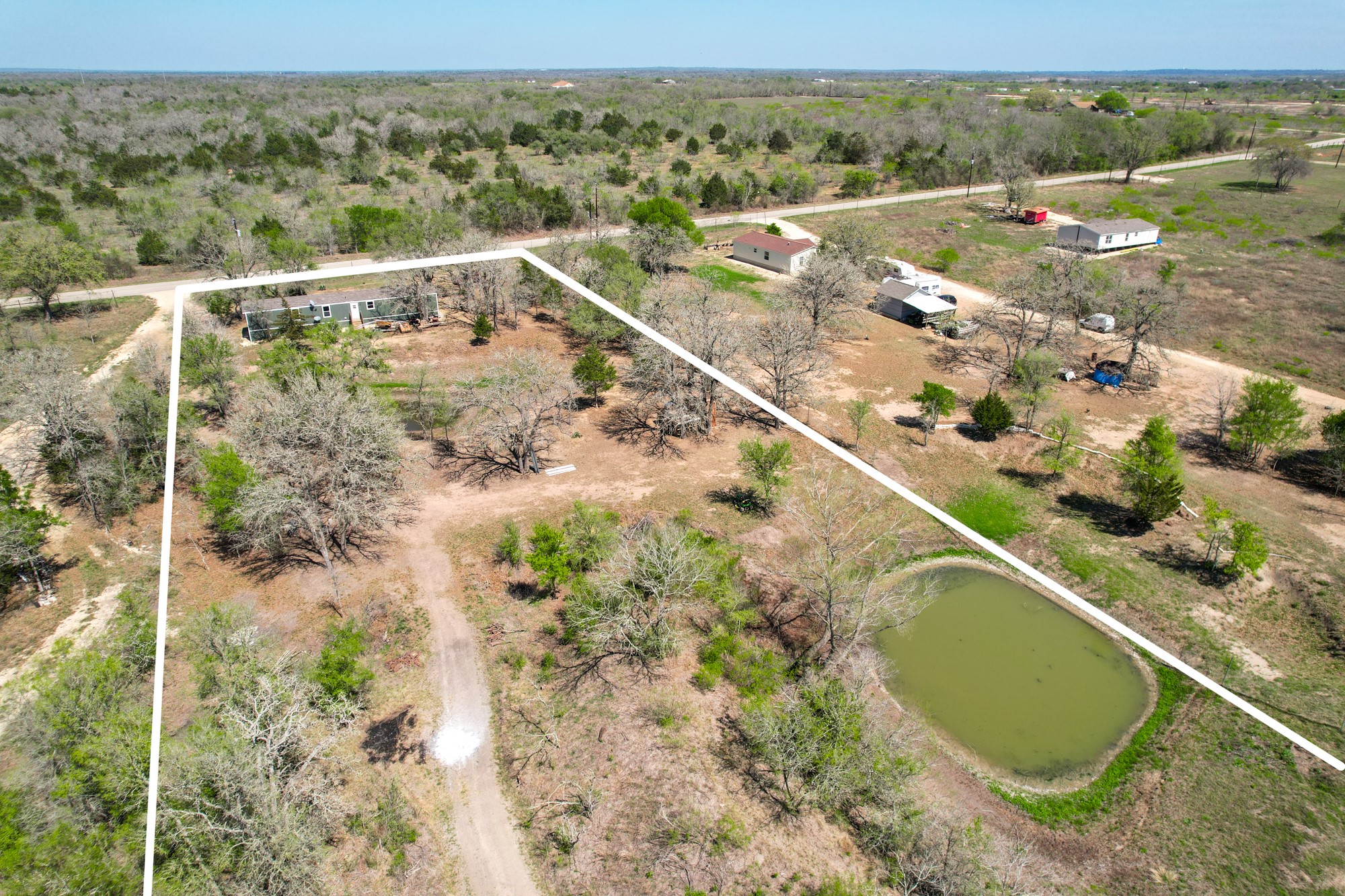 6739 Taylorsville Road Dale, TX 78616 - Photo 23 of 37 a view of a balcony with an outdoor space and seating area