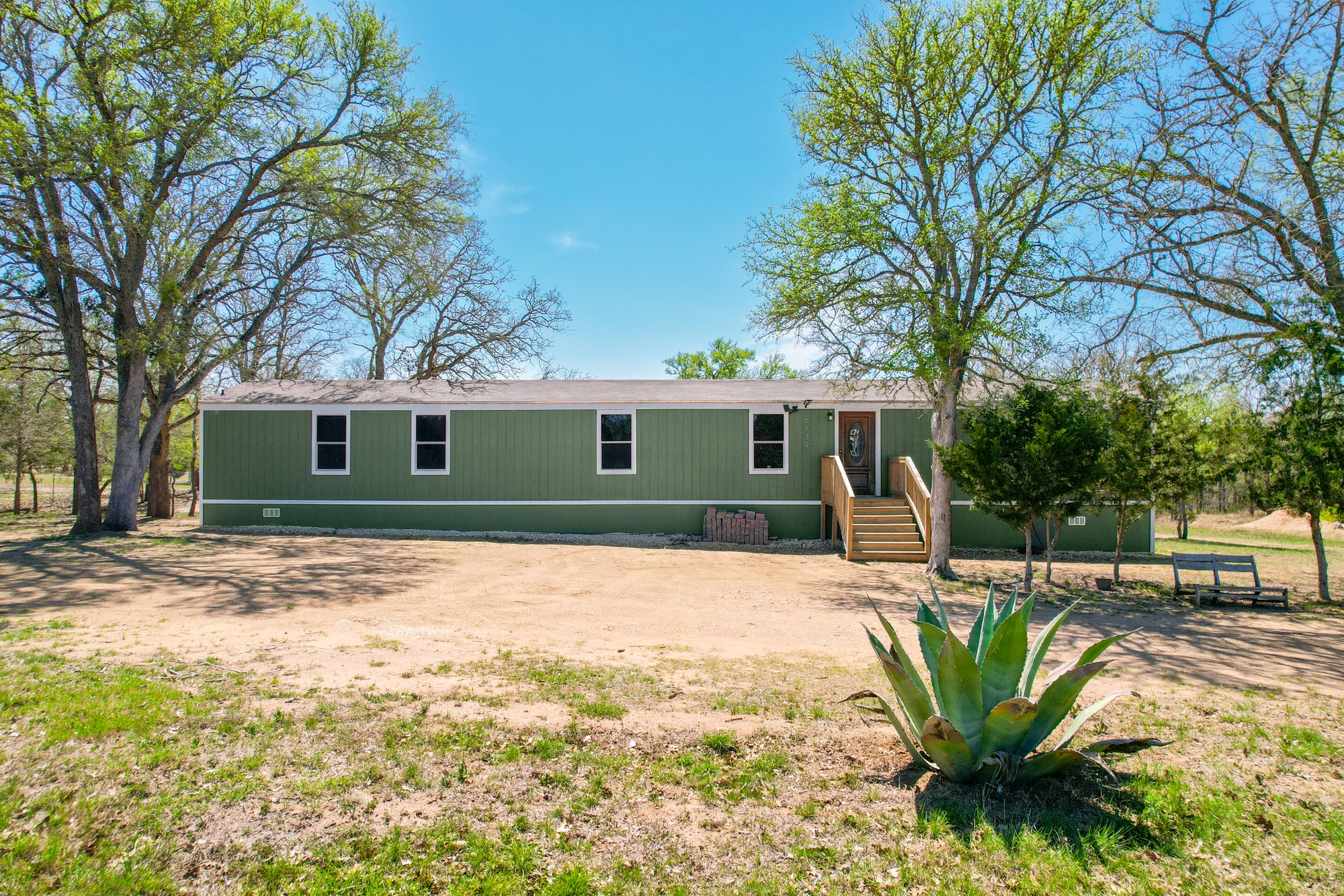 6739 Taylorsville Road Dale, TX 78616 - Photo 24 of 37 a view of a house with a yard